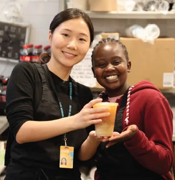 An LSC Instructor and student working on a class project together.