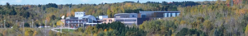 Panoramic photo of LSC including the lush forest that surround the beautiful campus in Duluth, MN.