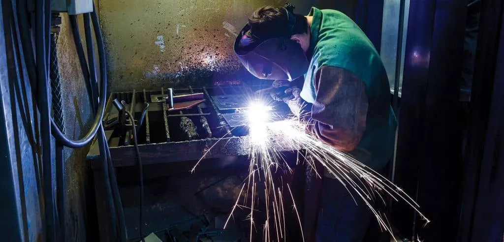 Welding student welding